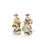 A pair of Bow figures of Harlequin and Columbine from the Commedia dell'Arte, c.1755-60, each seated