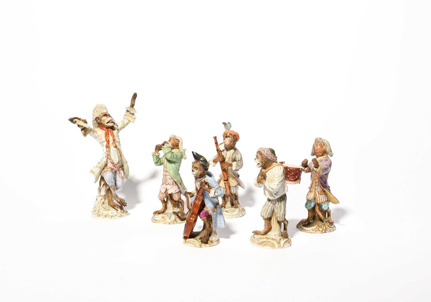 Six associated Meissen figures from a monkey band (affenkapelle), late 19th/20th century, the simian