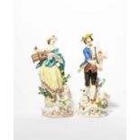 A near pair of Meissen figures of a musical shepherd and his companion, c.1750-60, modelled by J J