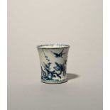 A rare Lowestoft blue and white beaker, c.1760-62, the slightly waisted form painted in a dark