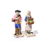 A pair of Continental faïence figures of street vendors, c.1780 or later, one modelled as a girl