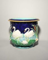 A large George Jones Majolica jardinière, c.1875, of deep U shape, moulded in relief with swans
