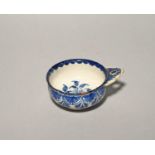 A Bristol delftware bleeding bowl, c.1730, the shallow circular form painted to the exterior with