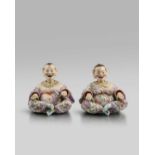 Two Meissen pagoda figures, late 19th/20th century, modelled as a Chinaman and his female companion,