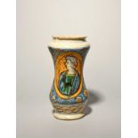 A Sicilian maiolica albarello, late 17th century, the waisted form painted in blue, green, yellow