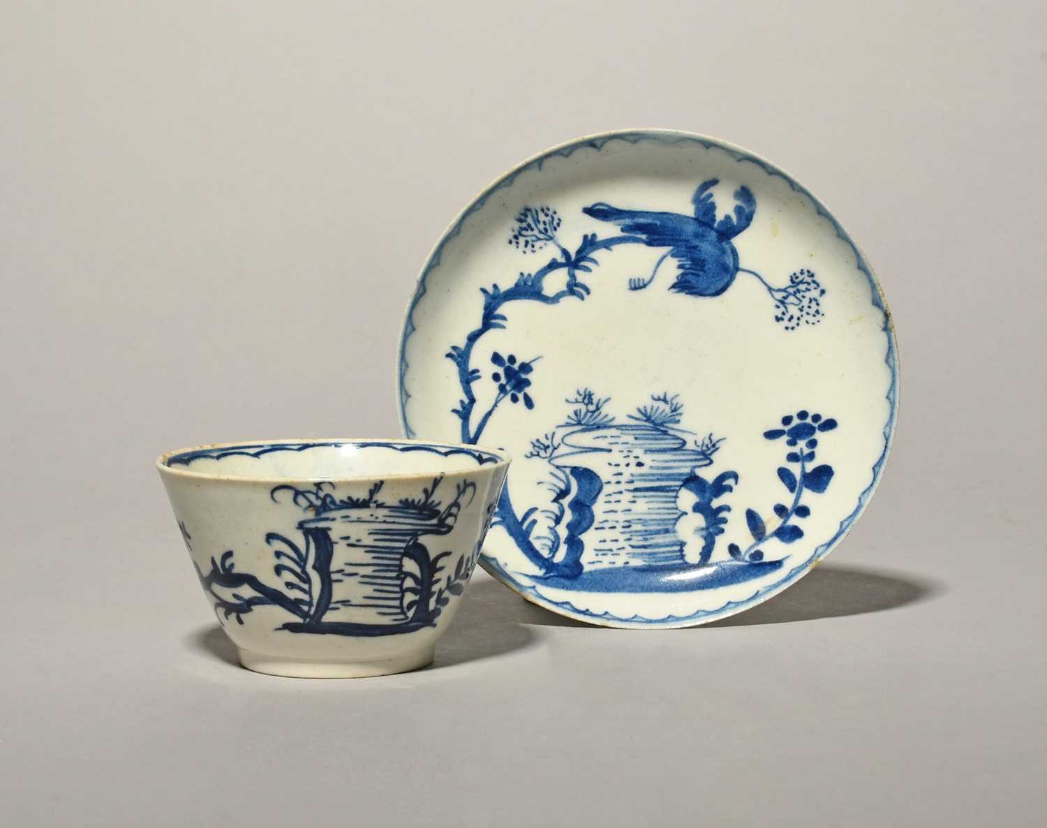 An early Bow blue and white teabowl and saucer, c.1754-55, the teabowl of flared form, both