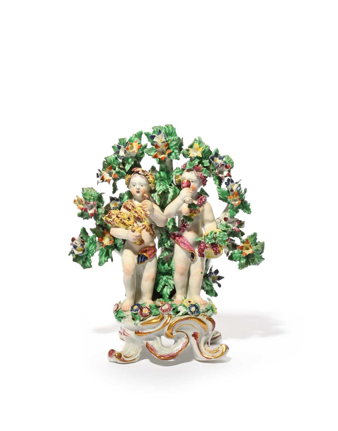 A Bow figure group emblematic of Summer and Autumn, c.1765, modelled with two putti standing