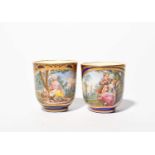 Two Sèvres coffee cups, date codes for 1765 and 1774, painted by Jean-Etienne Chabry with pastoral