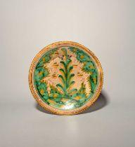 A Talavera or Puente del Arzobispo dish or small charger, 17th century, painted in a palette of