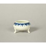 A rare Worcester blue and white tripod salt, c.1765-70, of squat circular form in the Chinese