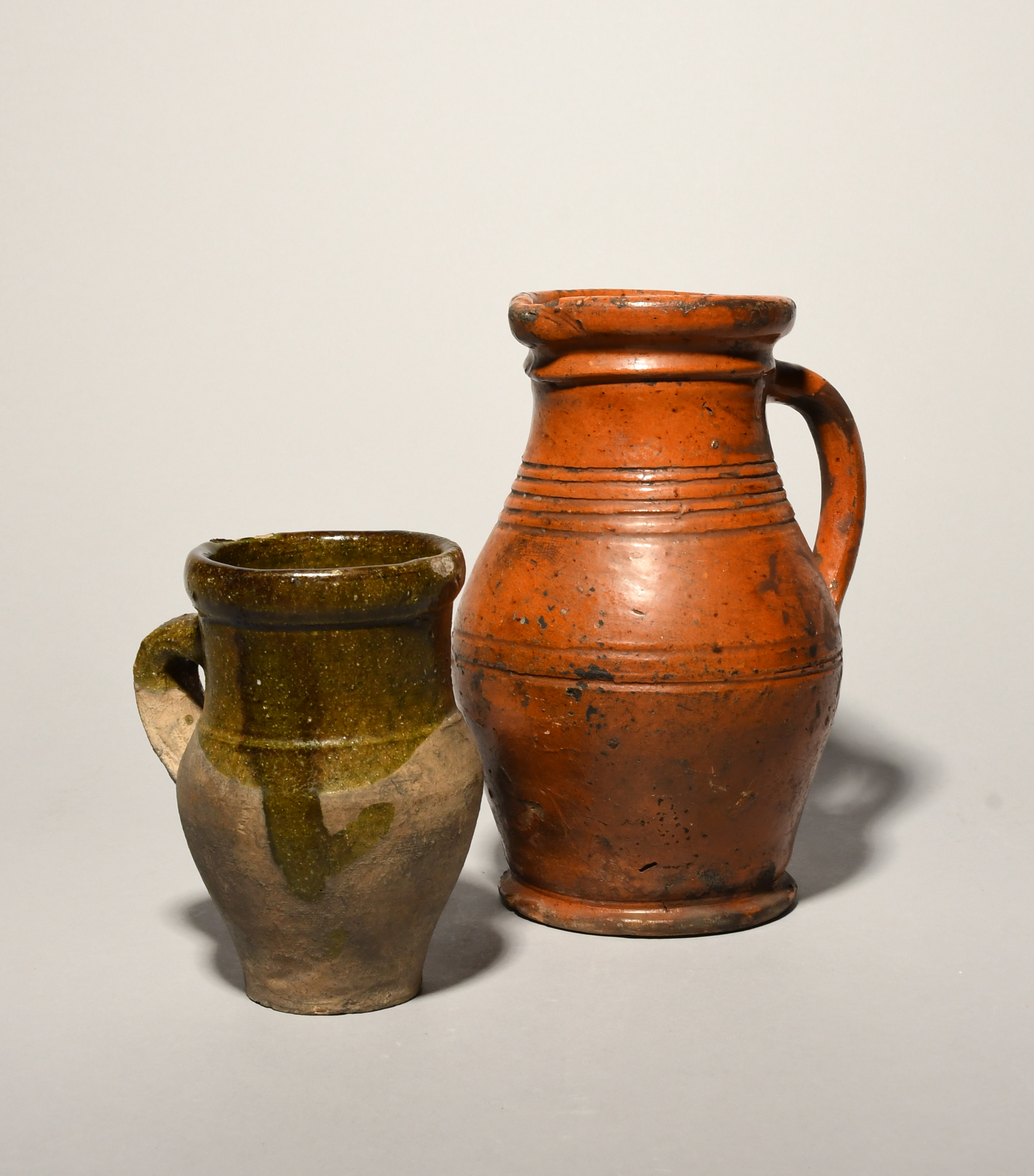 A rare post-medieval redware jug, 16th century, the rounded body with a pulled spout, incised with - Image 2 of 3
