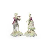 A pair of Derby 'Pale Family' figures of a piper and his companion, c.1756-58, he wearing a pink