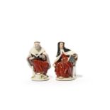 A pair of Chelsea figures of a Nun and a Monk, c.1755, each seated on a studded box and wearing a