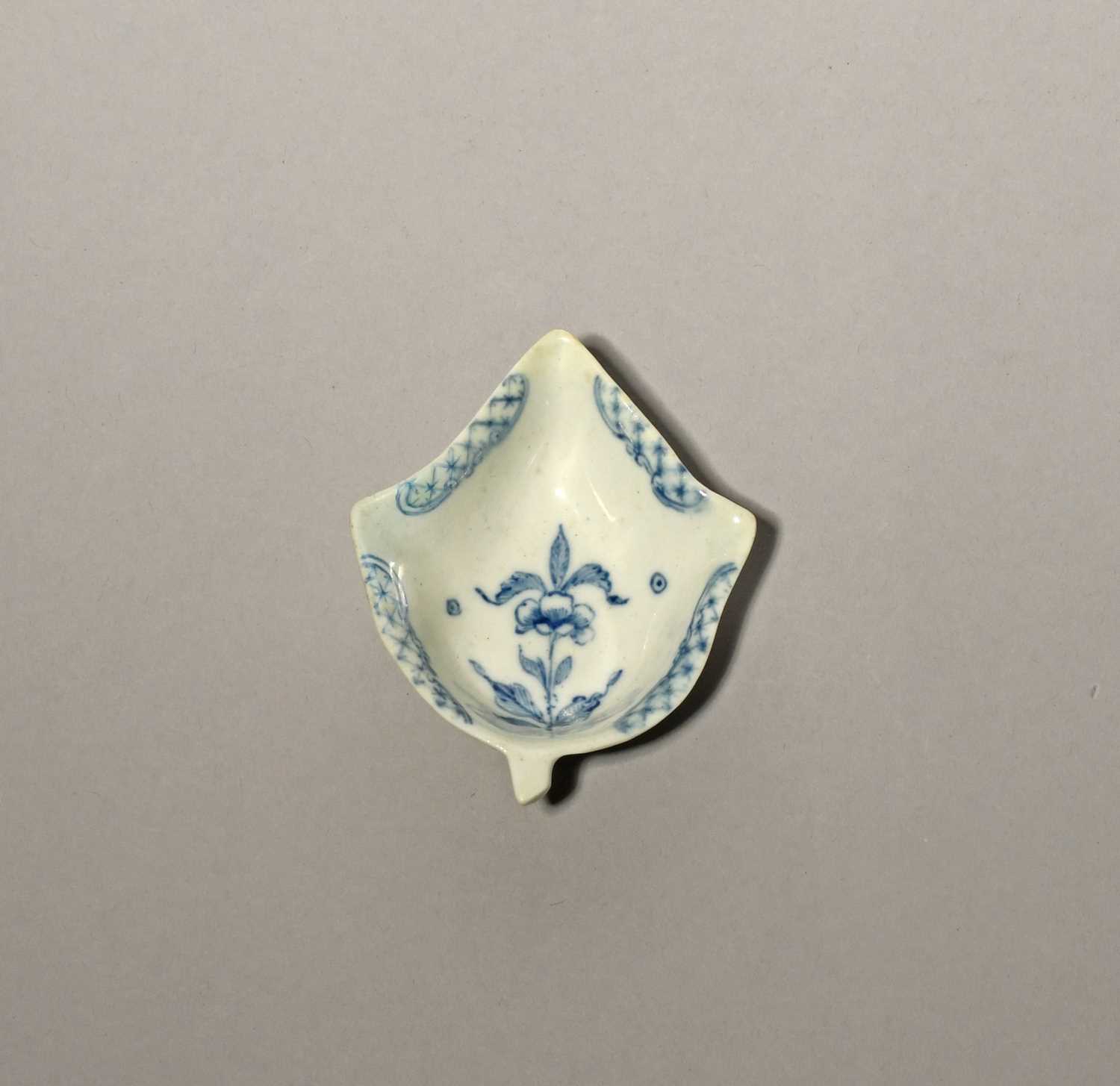 A rare Lund's Bristol blue and white pickle dish, c.1750, of deep leaf shape, the well painted