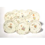 Ten Nymphenburg plates, c.1760-70, of silver shape, all painted with flower arrangements and