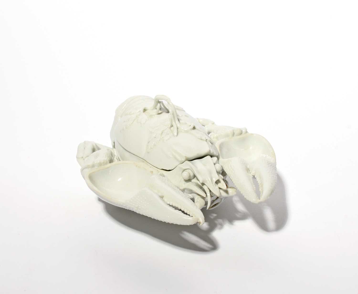 A Meissen white-glazed crayfish or lobster box and cover, late 18th century, finely modelled as