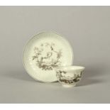 A Worcester teabowl and saucer, c.1758, finely potted with feather moulding, printed in black with