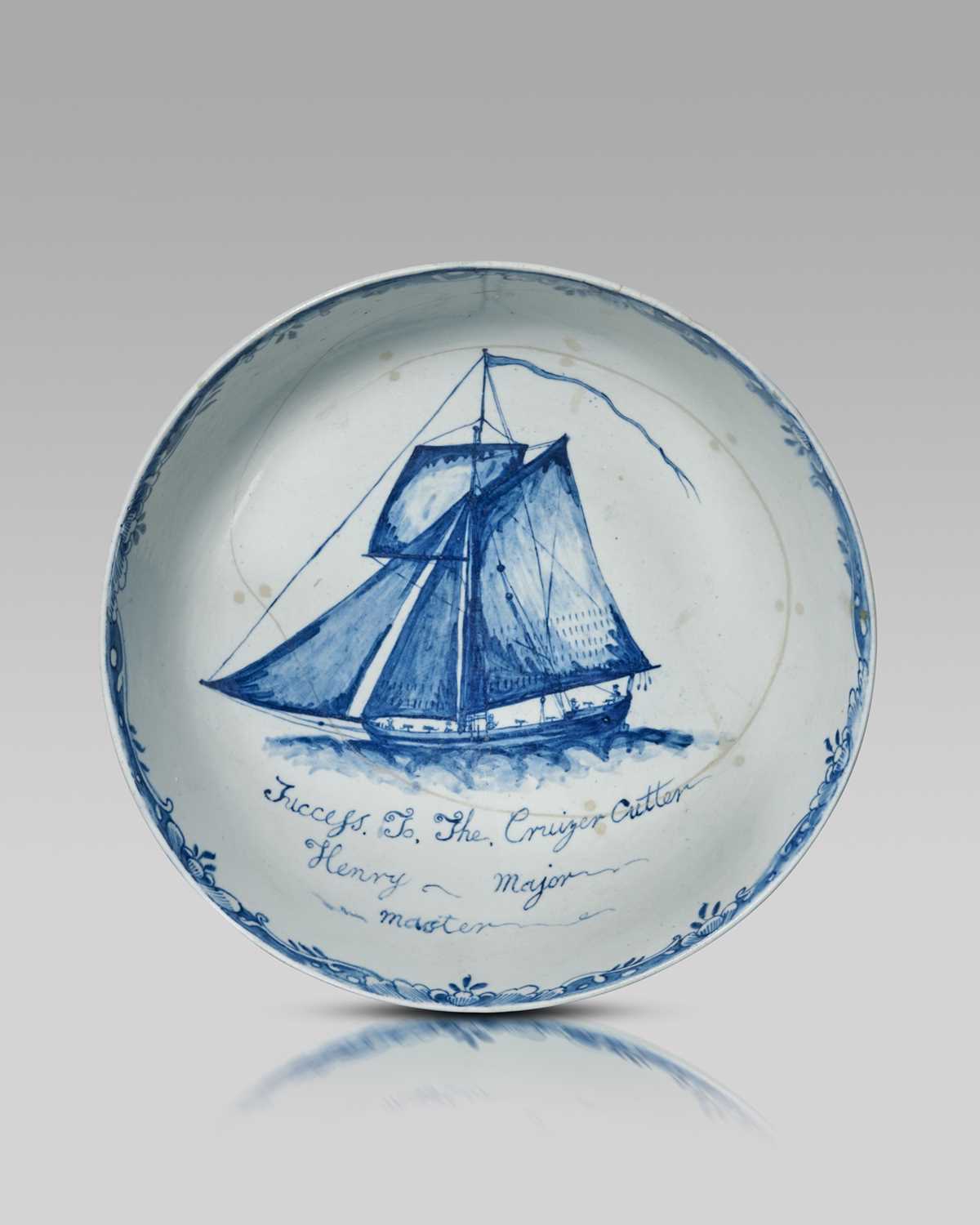 An important and documentary Lowestoft blue and white punchbowl, c.1760-62, the interior painted