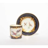 A Vincennes cup and saucer (gobelet calabré et soucoupe), c.1753-54, painted with colourful birds in