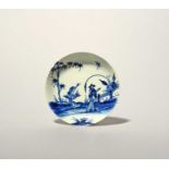 A Vauxhall blue and white saucer, c.1755-58, painted with a heron or other bird perched on a stone