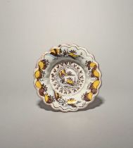 A rare Brislington lobed dish, c.1680, unusually painted in a three-colour palette with manganese,
