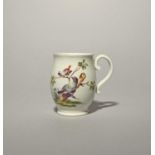 A good Derby bird mug, c.1758, of small size, well painted with two birds perched on low branches,