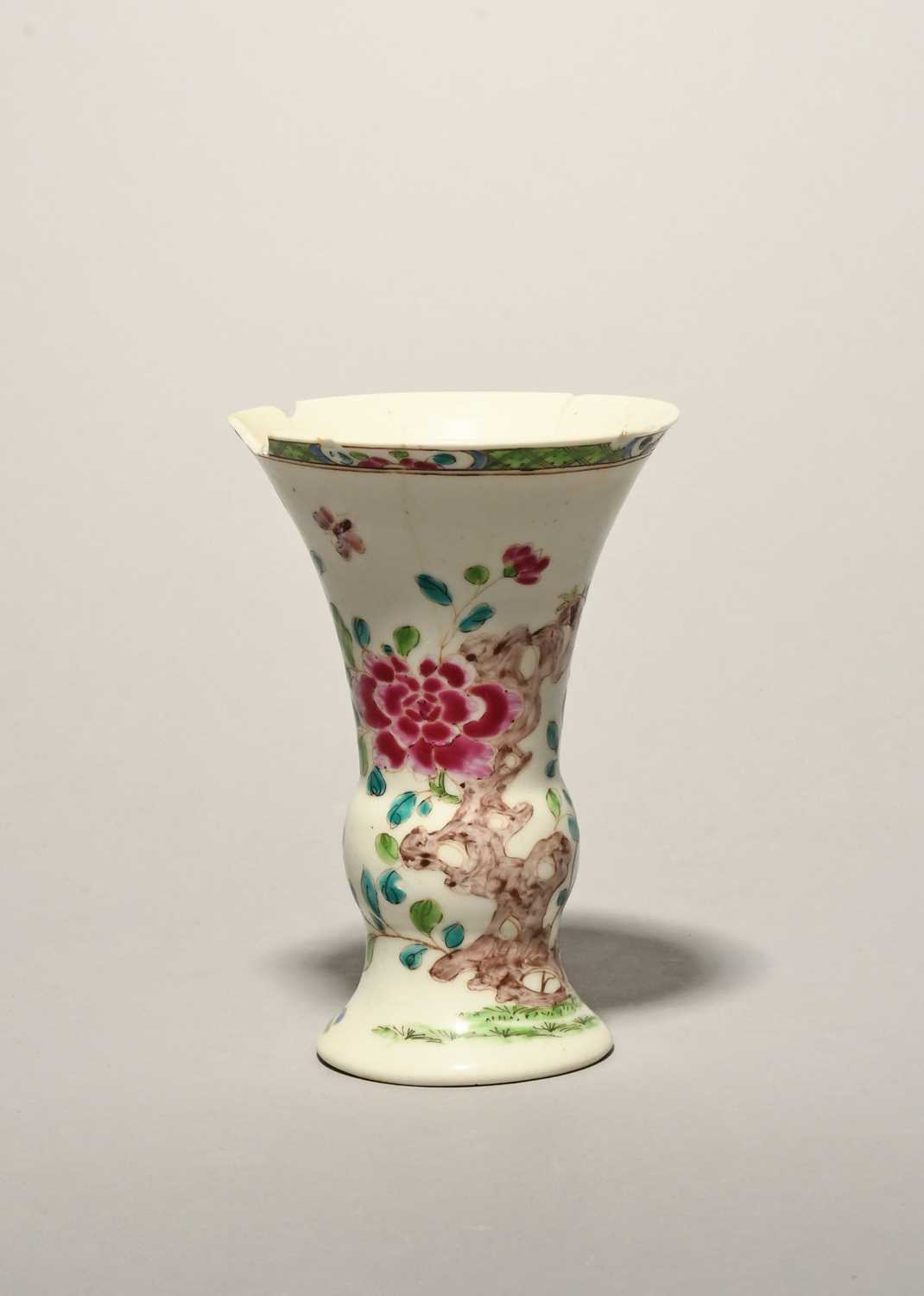 A rare and early Bow vase, c.1750-53, of gu beaker form, the flared knopped form brightly