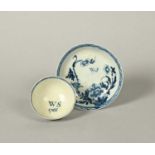 A Richard Chaffers (Liverpool) blue and white teabowl and saucer, dated 1766, painted with a small