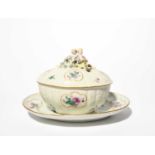 A Meissen oval tureen with cover and stand, mid 18th century, moulded with rococo floral panels,