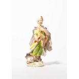 A Meissen figure of a Persian monarch, c.1740, modelled by J J Kändler and Peter Reinicke, wearing a