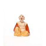 A small German porcelain pagoda figure, 19th century, after Meissen, depicting a bare-chested monk