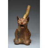 A Moche stirrup spout vessel