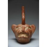 A Moche stirrup spout vessel