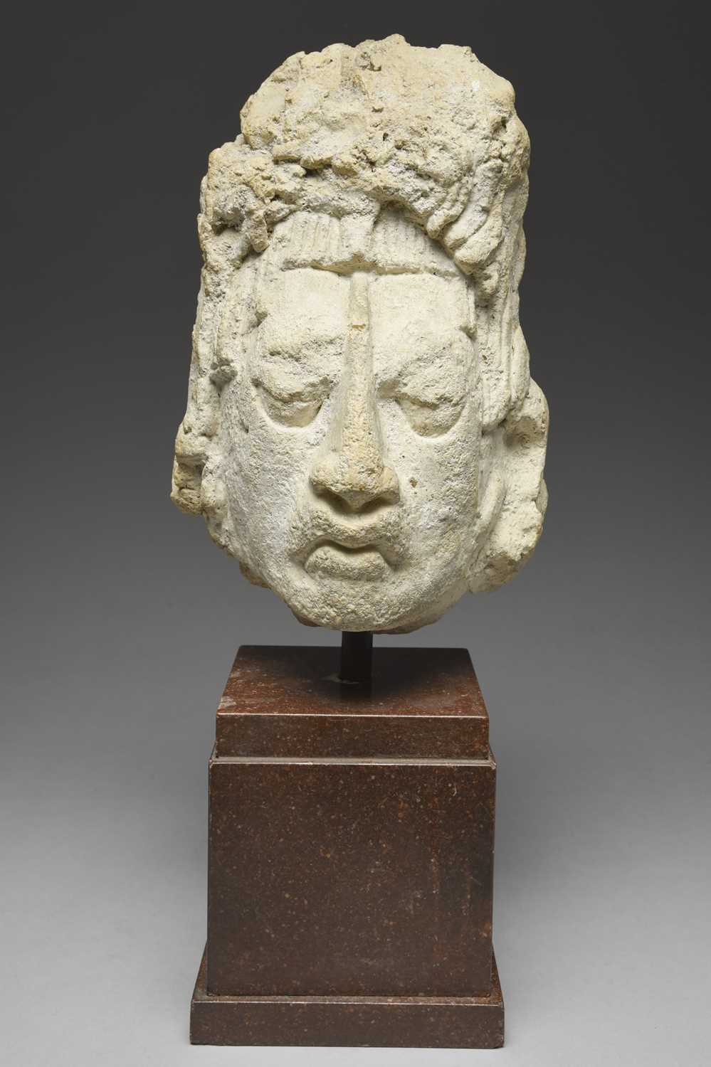 A Maya stucco headMexico, circa 250 - 750 ADthe finely modelled face with a roughly modelled