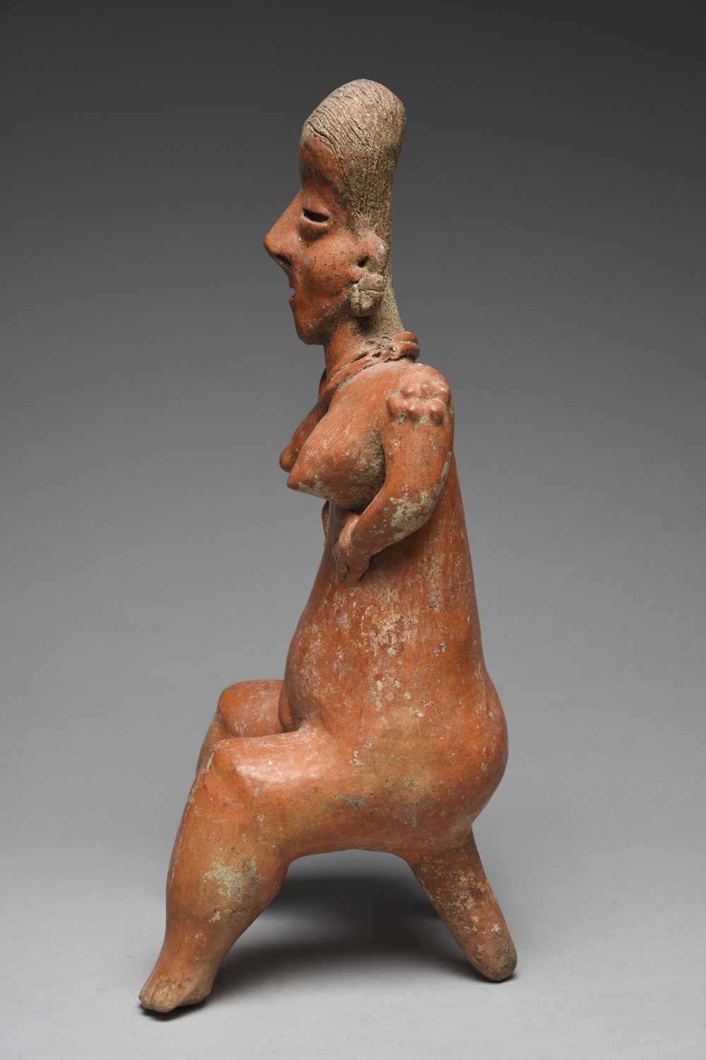 A Nayarit seated female figureMexico, circa 100 BC - 250 ADpottery, with a linear incised coiffure - Image 2 of 5