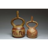 Two Moche stirrup spout vessels