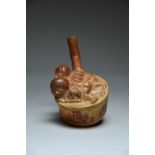 A Moche stirrup spout vessel