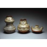 Three Shipibo mask vessels