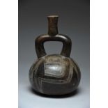 A Chavin stirrup spout vessel