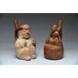 Two Moche stirrup spout vessels