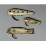 λThree Inuit fish hooks