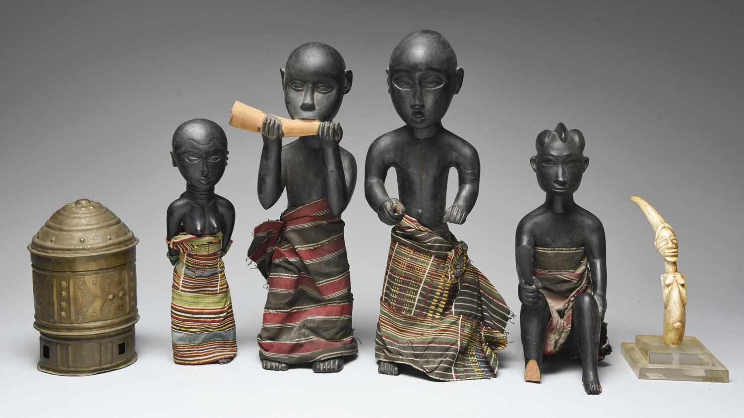 Four Ashanti figures in the manner of Osei Bonsu