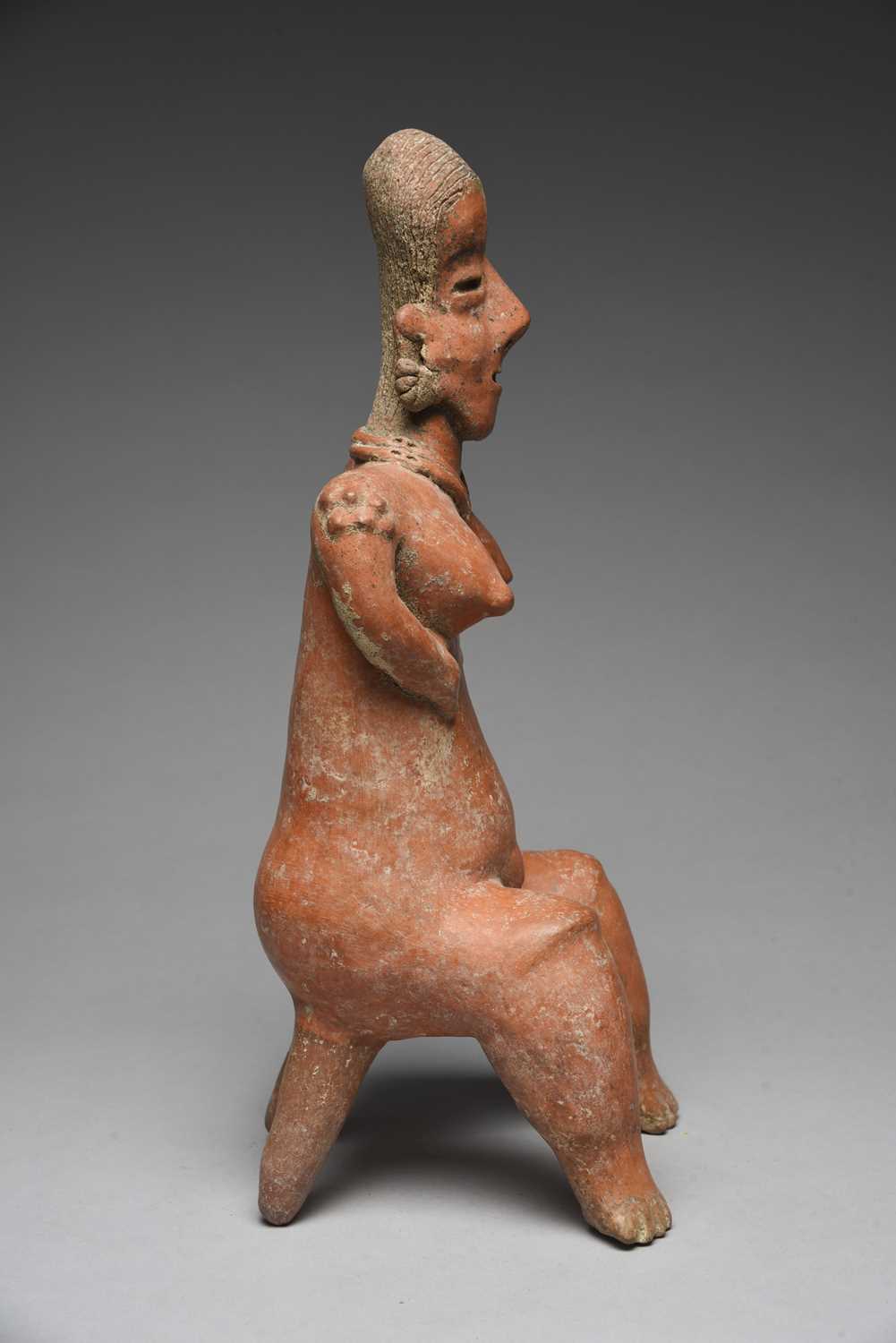 A Nayarit seated female figureMexico, circa 100 BC - 250 ADpottery, with a linear incised coiffure - Image 4 of 5