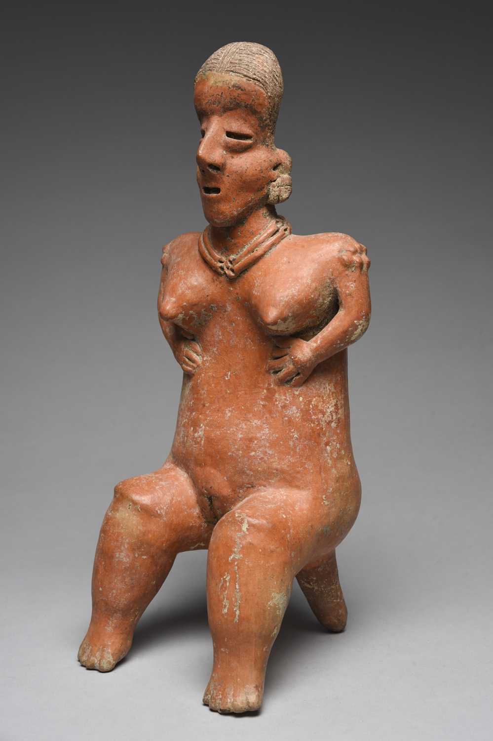 A Nayarit seated female figureMexico, circa 100 BC - 250 ADpottery, with a linear incised coiffure - Image 5 of 5