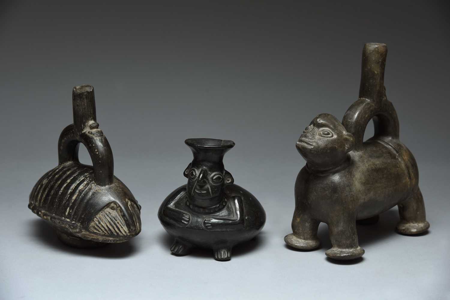 Two Chimu stirrup spout vessels