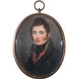 λ λEnglish School Early 19th CenturyPortrait miniature of a gentleman wearing a black coat and a red