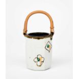 ‡ John Maltby (1936-2020) a stoneware pot with cane handle, octagonal cylinder form, painted with