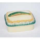 A Clarice Cliff Sardine dish and cover, shape no.447, rounded rectangular section, the cover