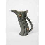 ‡ Walter Keeler (born 1942) an extruded jug with thorn handle, covered in a grey glaze with