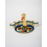 'Mondrian' a Clarice Cliff Bizarre duck egg cruet tray, painted in colours, and six Clarice Cliff